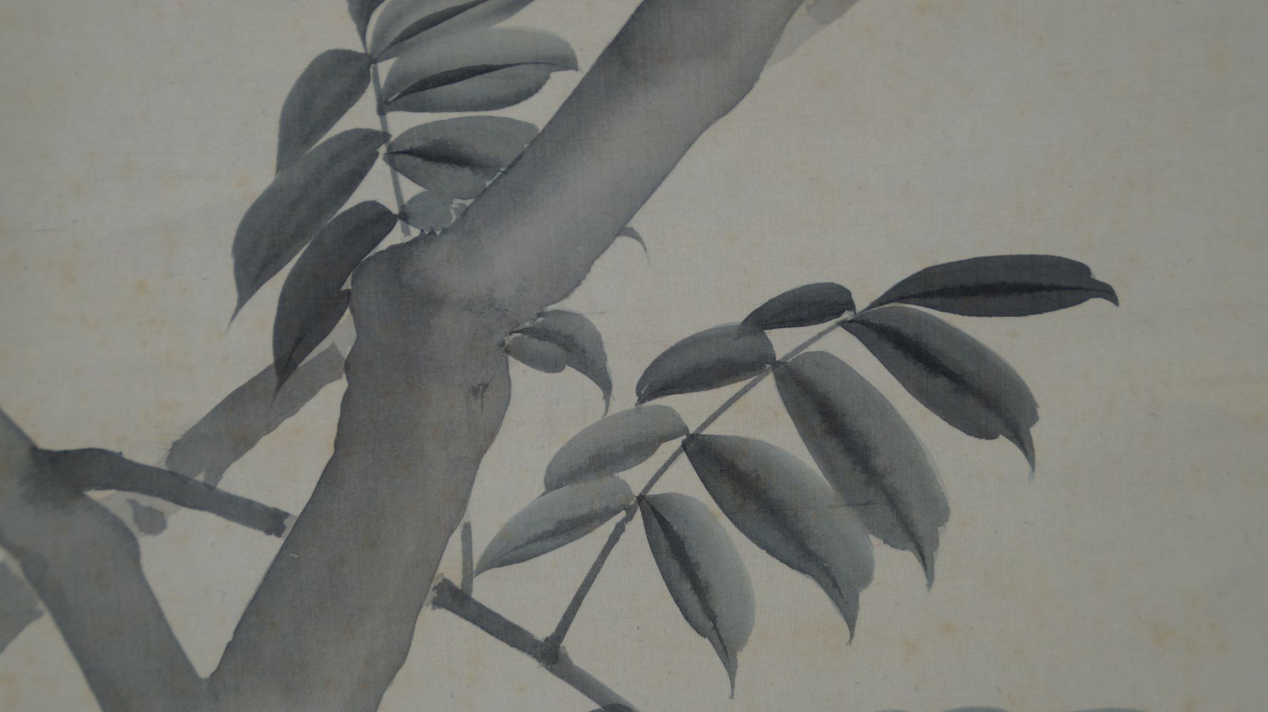 Close-up of the ink-painted branches of the fruit tree in the kakemono Bird on Fruit Tree