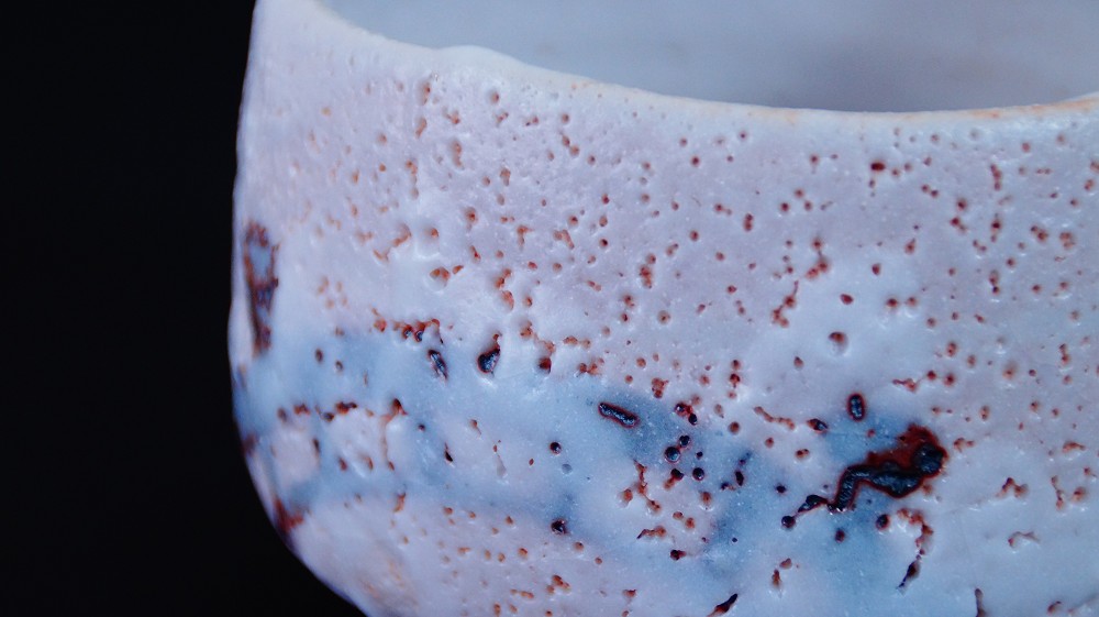 Further Close-Up of the Glaze with Blue-Gray Ash Area and Red Fire Marks of the Chawan Made of Shino Ware by Jyuzo Sato