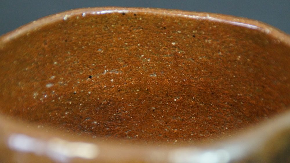 Close-up of the textured interior glaze of the chawan made of Ohi ware