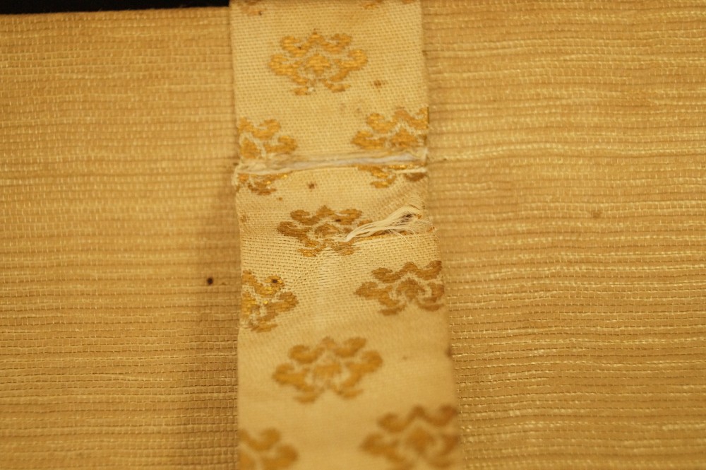Lady in striped kimono mounting close-up