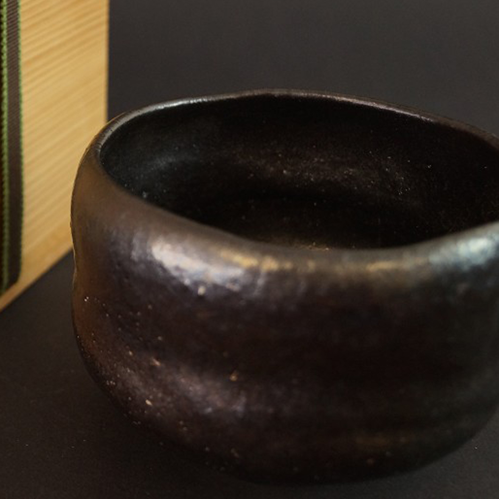 Chawan made of Raku ware by Shoraku Heian motif close-up preview