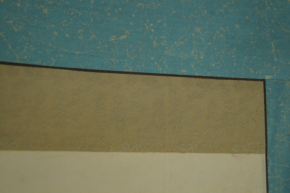 Calligraphy print Create Justice close-up of the fabric mounting mounting detail