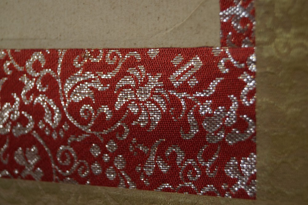 Rotgoldener Brokatrand Eckdetail Montierungsdetail