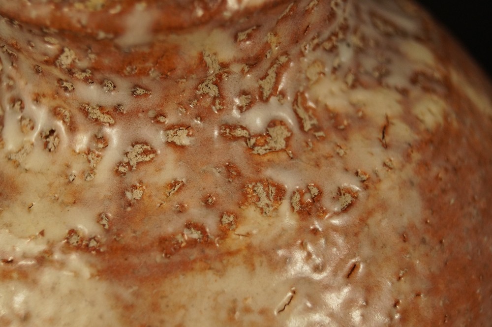 Orange fired glaze areas on the body Glaze Close-Up 2