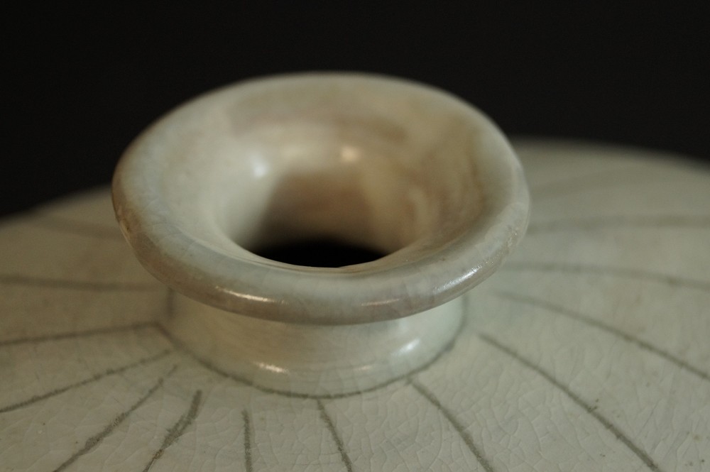 Close-up of the flared mouth of the vase neck view close-up