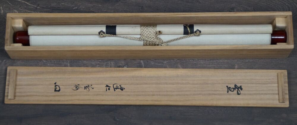 Opened storage box with inscription and rolled-up Kakemono Calligraphy Snow