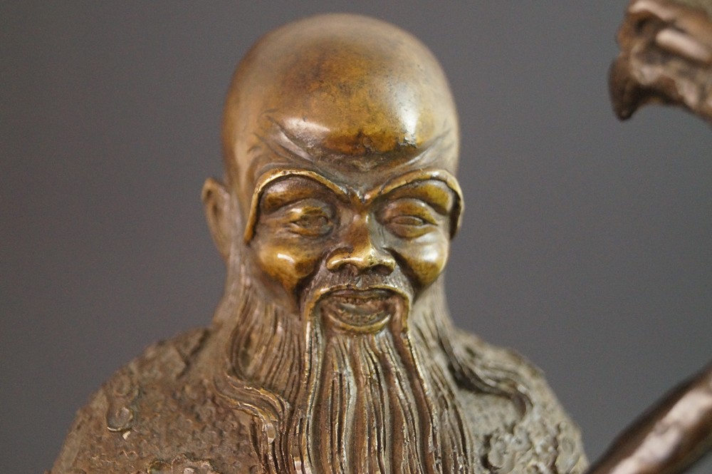 Laotse Figur aus Bronze Gesicht Nahaufnahme