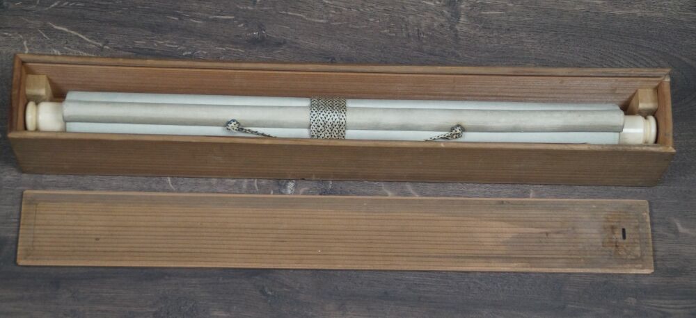 Opened storage box with rolled-up Kakemono Pomegranate Branch and Starling