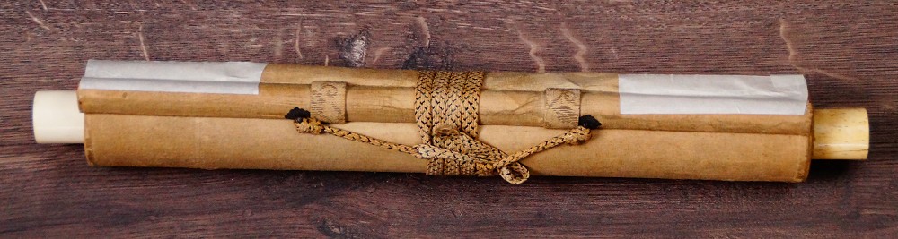 Rolled-up hanging scroll by Sobun with cord tie
