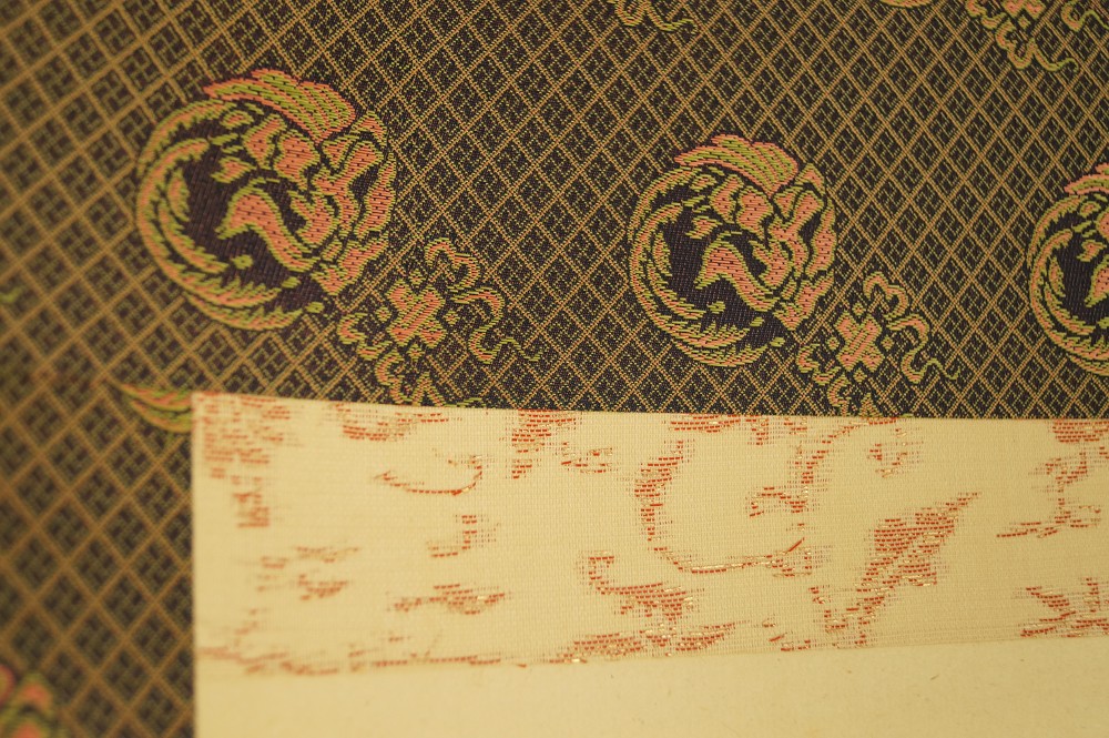 Lady under wisteria blossoms mounting detail