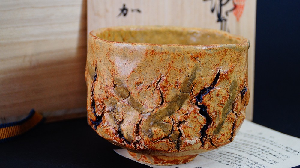 Chawan Made of Seto Ware by Takamichi Kato in front of the Storage Box with Certificate of Authenticity