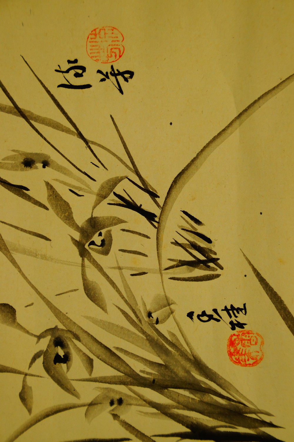 Close-up of the finely painted grasses with black blossom dots