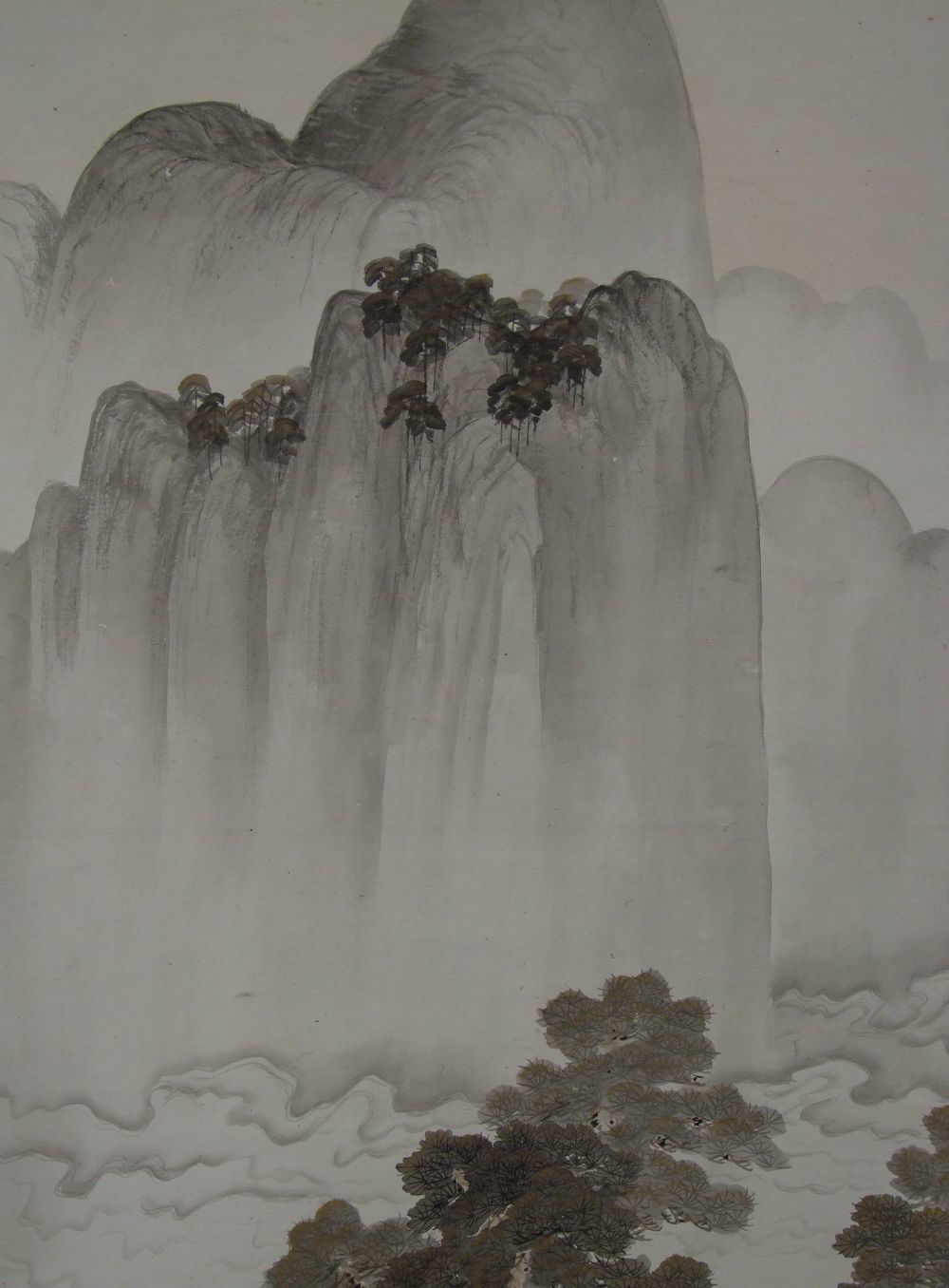 Further detail view of the mountain pines and rock face in the hanging scroll Landscape with Pavilion