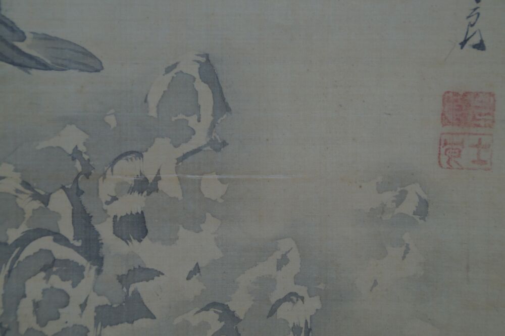 Detail view of the spray at the base of the waterfall with artist's signature and red seal in the Kakemono Koi at the Waterfall