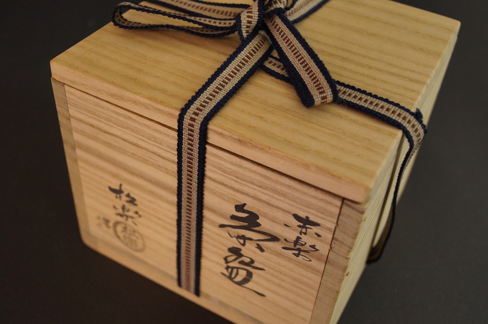 Storage box tied with cord