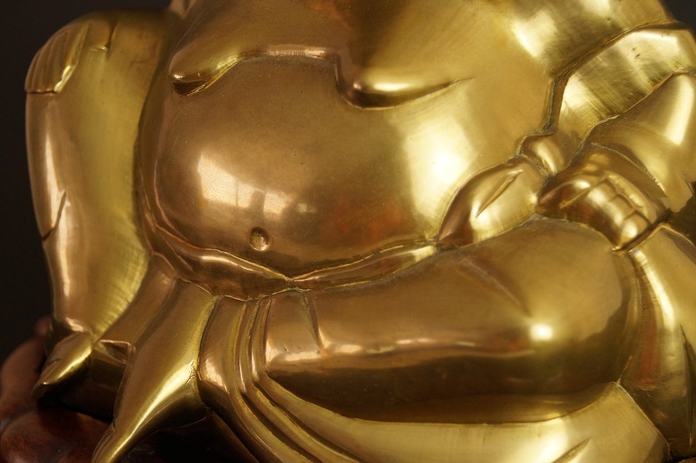 Hotei Figure Belly Motif Close-Up