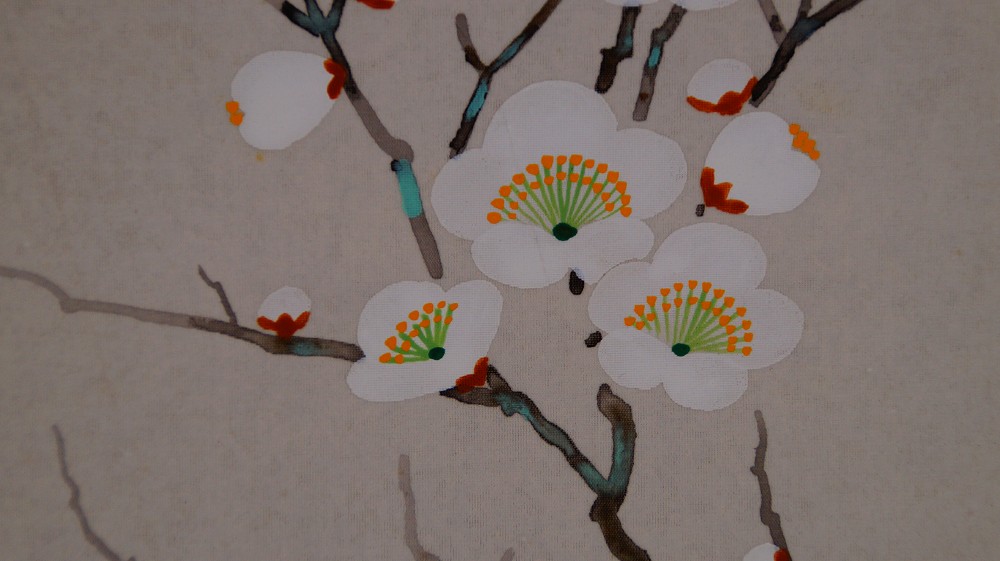 Extreme close-up of the white plum blossoms in the hanging scroll The Four Noble Plants by Endo Keizo