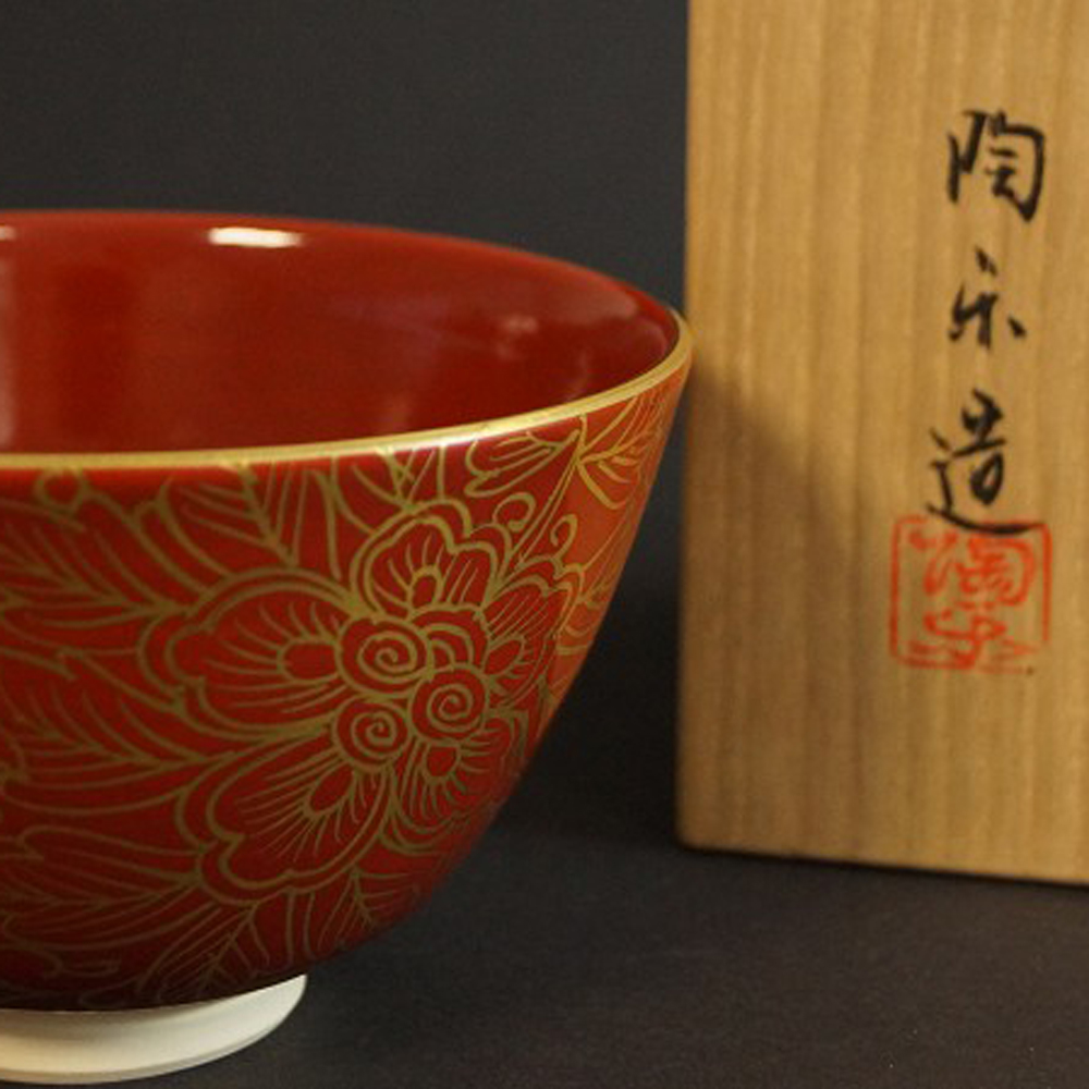 Red Tea Bowl with Golden Peony Motif Next to Storage Box Motif Close-Up Preview