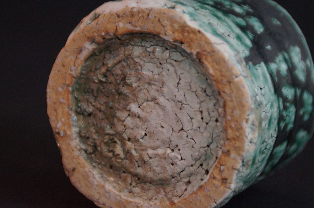 Close-up of the unglazed foot with crackled interior surface
