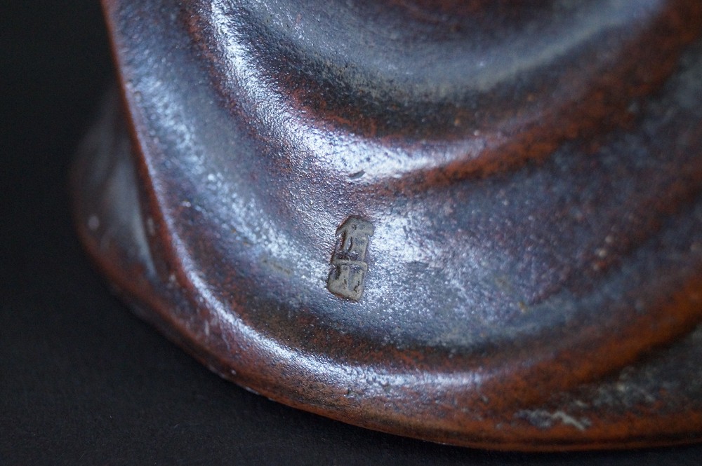 Daruma Figure Made of Bizen Ware Potter's Mark Close-Up