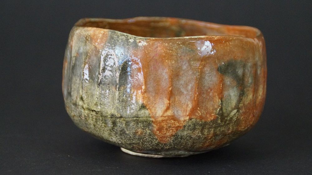Further view of the chawan tea bowl of Raku ware from the side