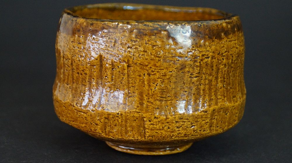 Further View of the Chawan Made of Raku Ware from the Side with Honey-Colored Glaze