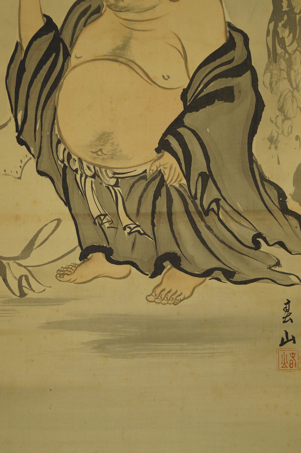 Hotei under the pine hanging scroll robe and feet motif close-up