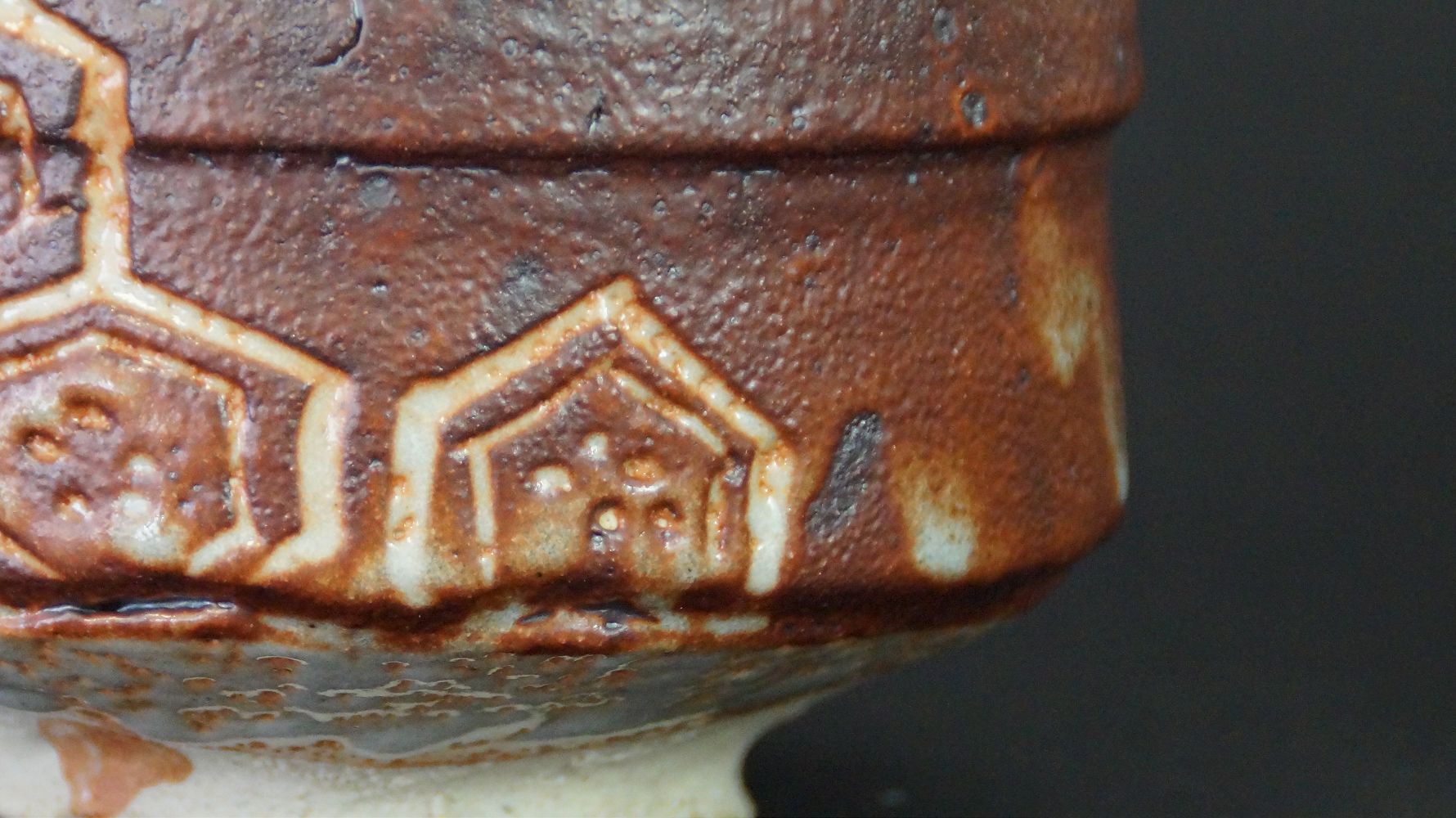 Close-up of the rim with incised hexagon pattern of the chawan tea bowl made of Shino ware