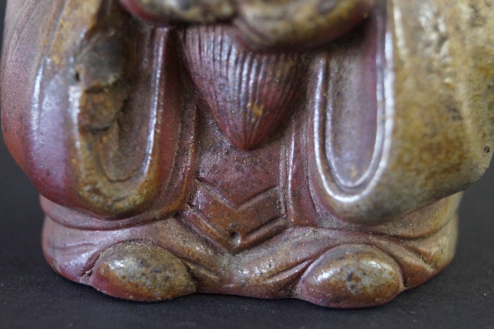 Fukurokuju figure robe motif close-up