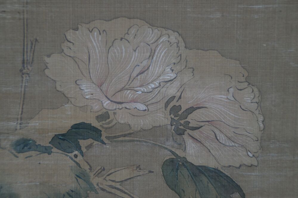 Close-up of the blooming peony blossoms in the hanging scroll Heron in Quiet Peony Splendor