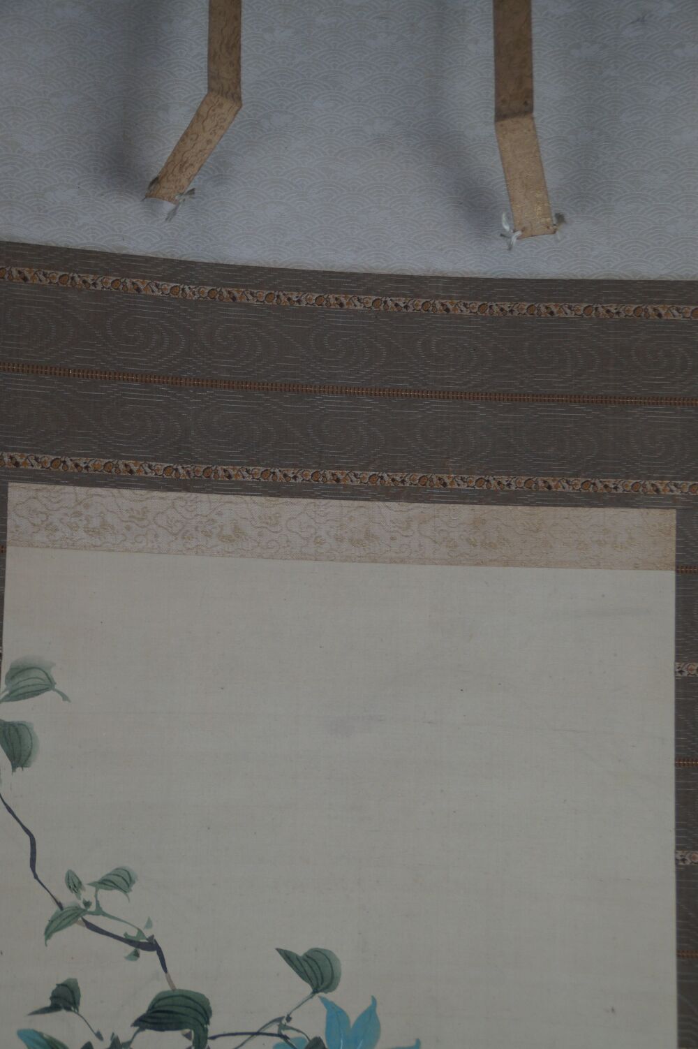 Detail View of the Silk Mounting with Wave Pattern and Hanging Cords of the Kakemono