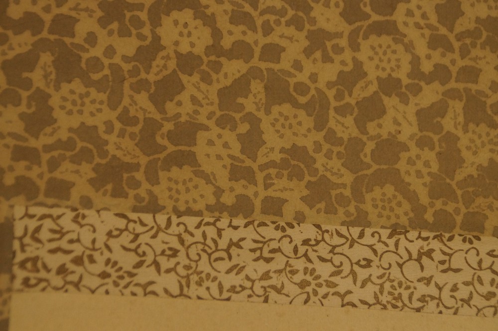 Close-up of the brown patterned mounting with narrow border