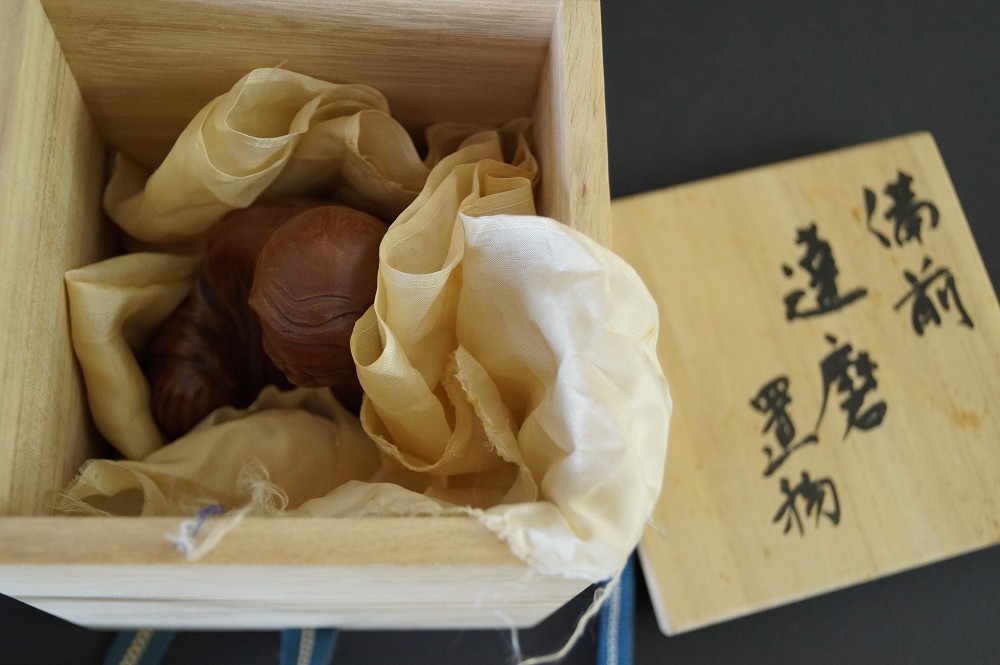 Bodhidharma Figur in Aufbewahrungsbox