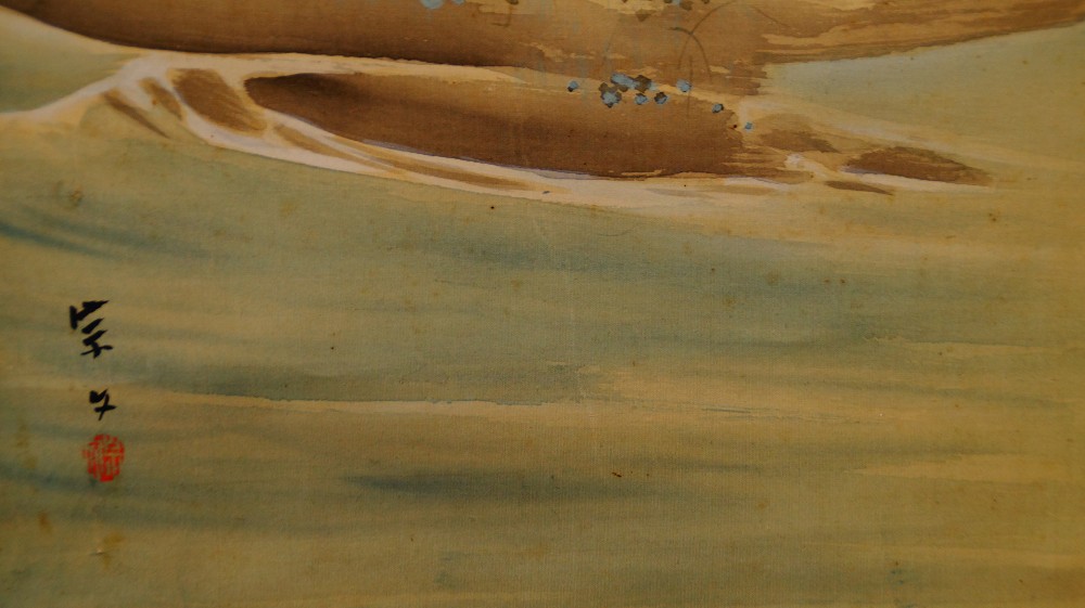 Close-up of the signature Soubun and the red seal at the water's edge of the hanging scroll