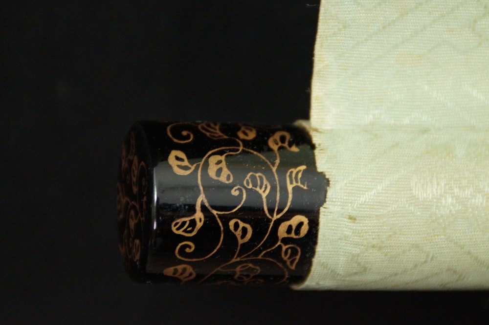 Close-Up of the Black Lacquered Jikusaki with Golden Vine Pattern