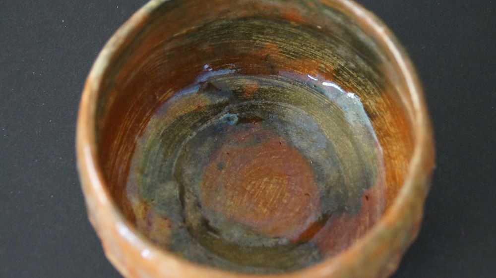 Close-up of the spirally applied interior glaze of the chawan tea bowl made of Raku ware