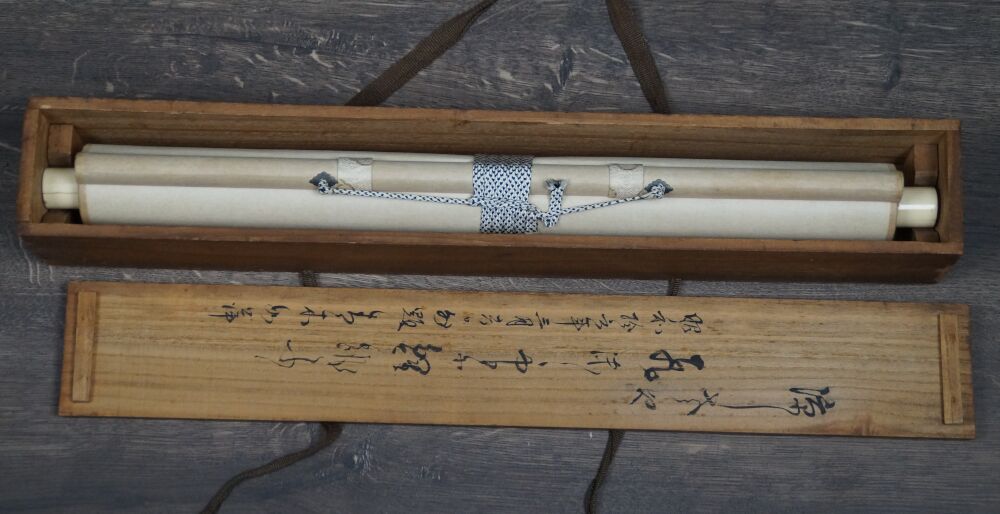 Opened storage box with rolled-up Kakemono Koi at Waterfall