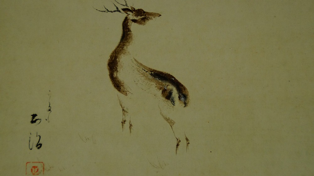 Close-up of the standing deer with antlers on the Kakemono