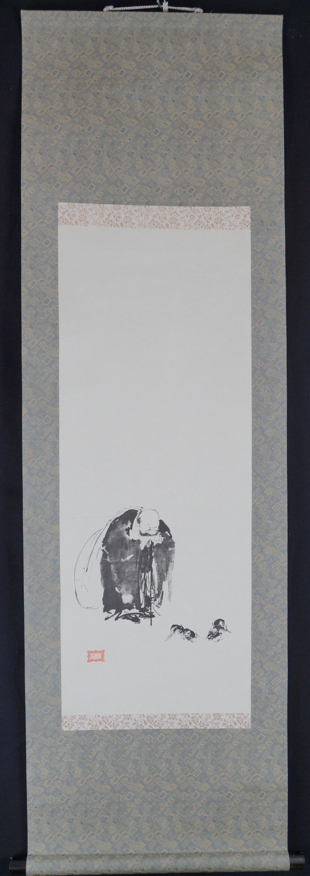 Hotei scroll of the triptych after Miyamoto Musashi in overall view with Hotei and two fighting roosters and gray-gold brocade mounting