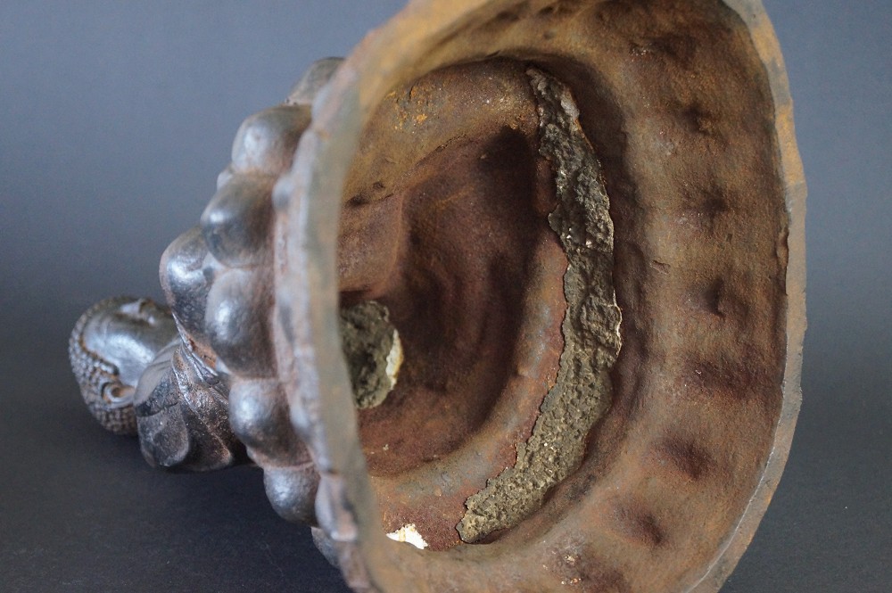 Japanese Buddha Figure Made of Iron Base Close-Up 1