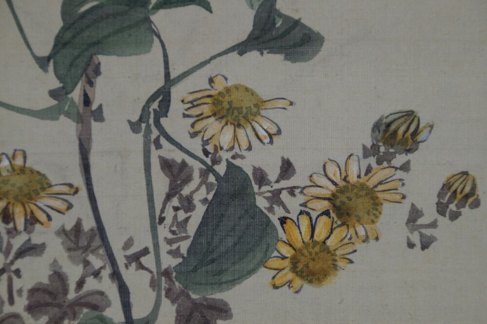 Macro shot of the yellow chrysanthemum bloom in the hanging scroll Autumn Riverside Vegetation with Butterfly
