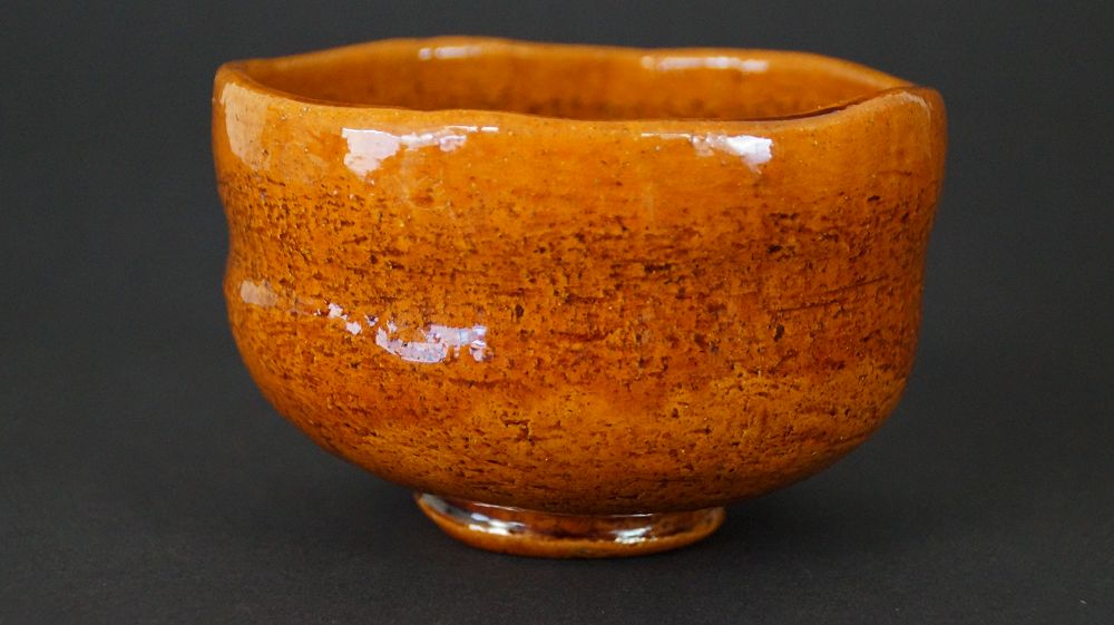 Another view of the chawan tea bowl made of Ohi ware with wavy rim shape