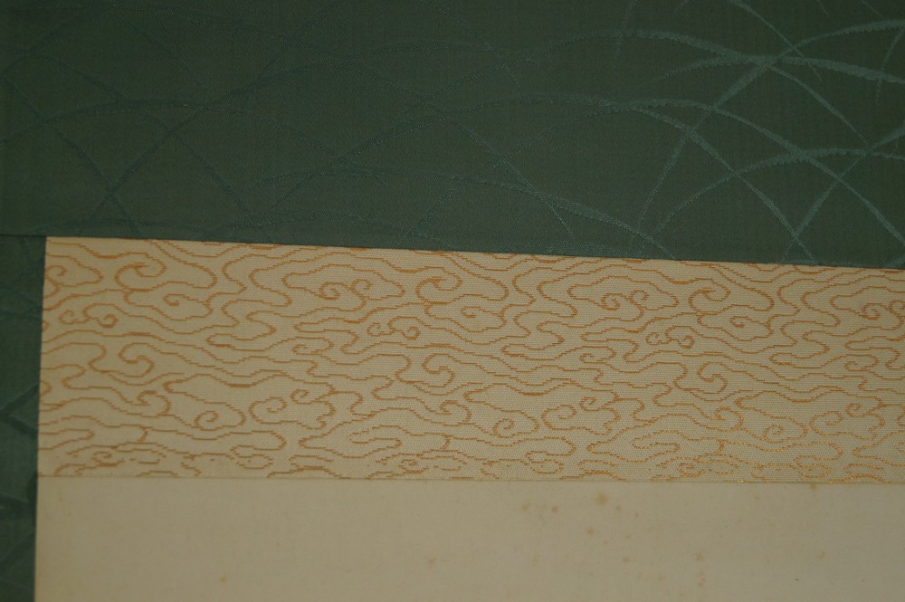 Silk brocade mounting detail shot