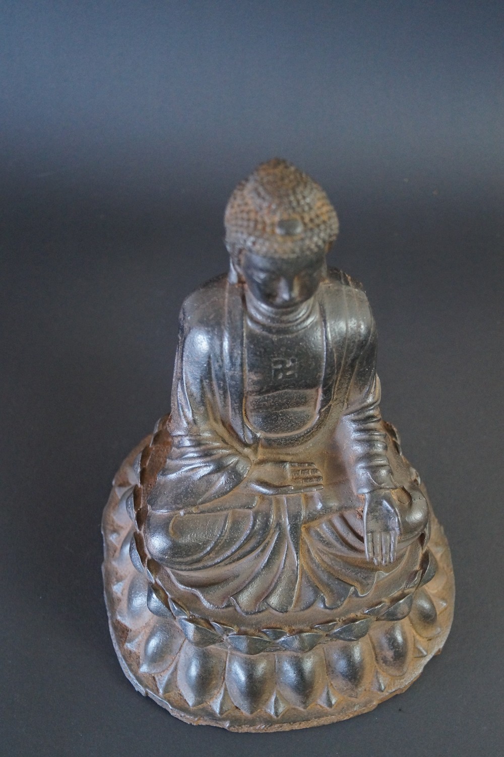 Japanese Buddha Figure Made of Iron View From Above