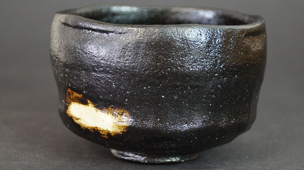 Additional view of the chawan made of Raku ware with glossy black glaze