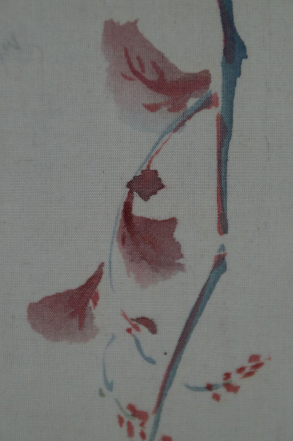 Close-up of the red petals and the branch in the Hanging Scroll Japanese Eggplant