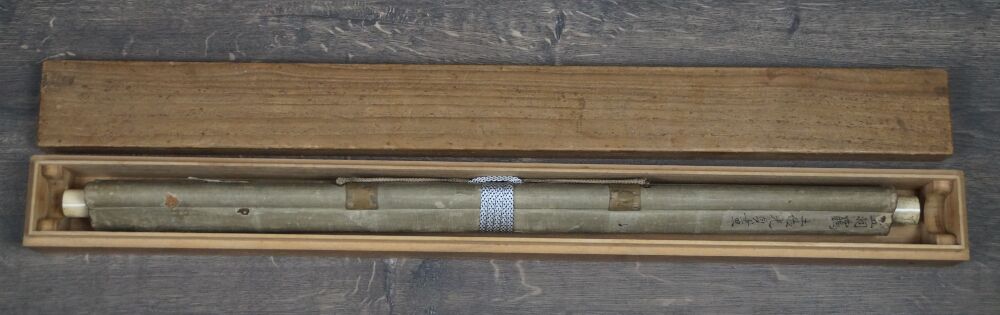 Further view of the opened storage box with the tied hanging scroll Cranes in Flight over Bamboo