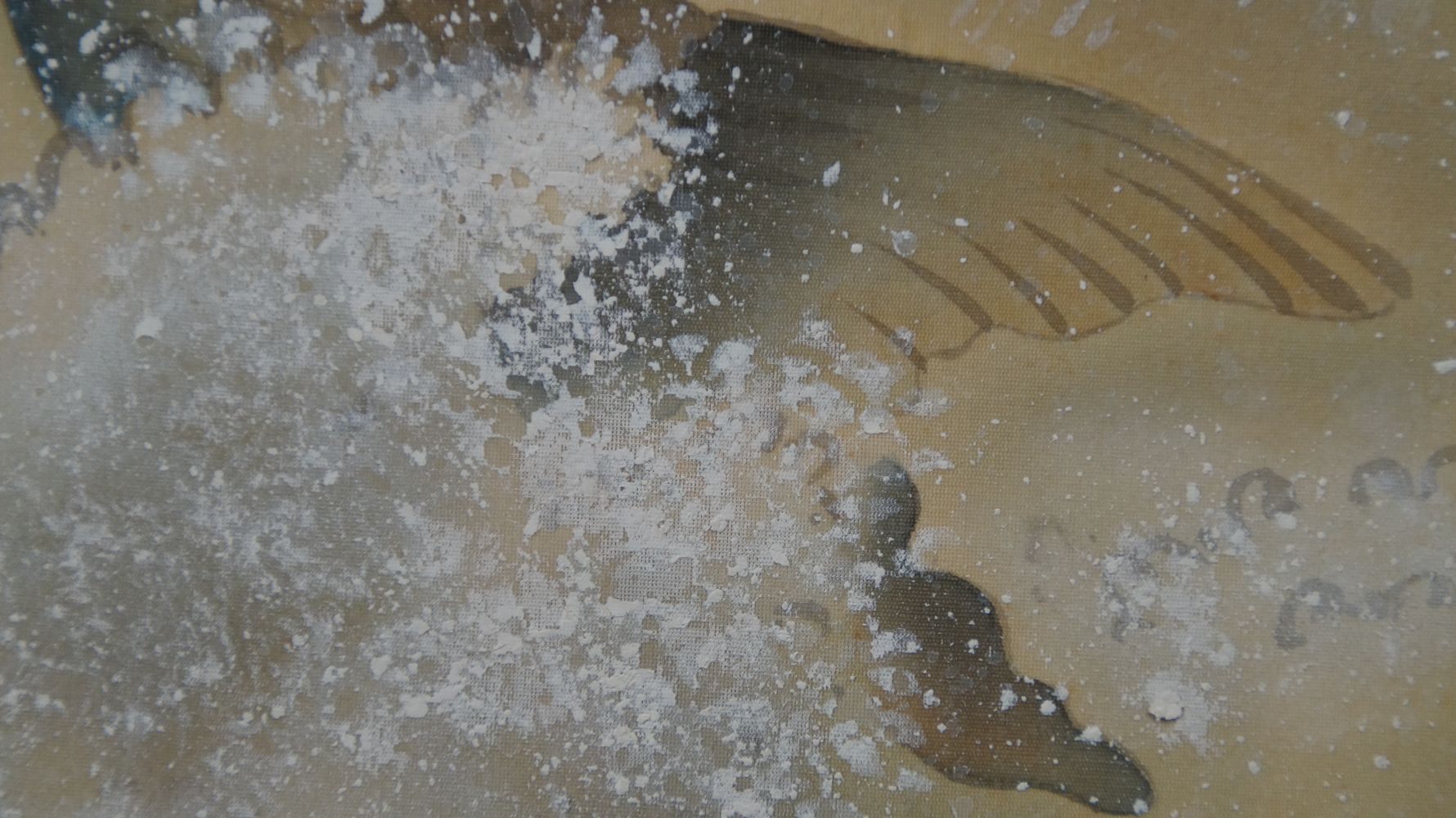 Close-up of the splashing spray next to the tail fin of the carp in the Kakemono Carp in a Turbulent Waterfall
