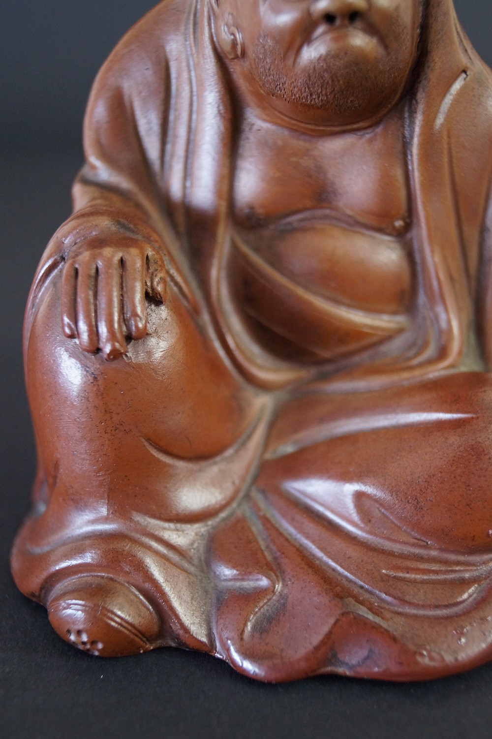 Bodhidharma Figur Hand Motiv Nahaufnahme