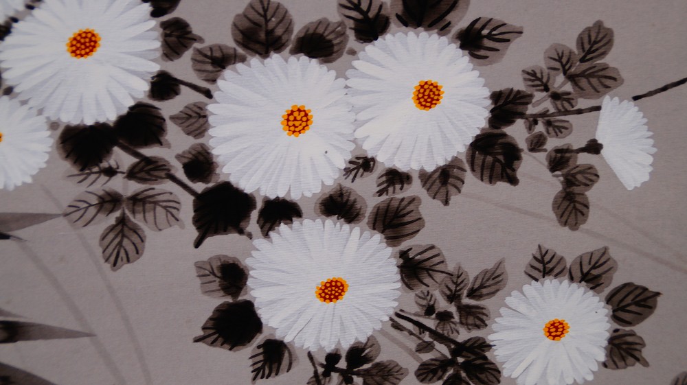 Close-up of the white chrysanthemums with ink wash leaves in the hanging scroll The Four Noble Plants by Endo Keizo